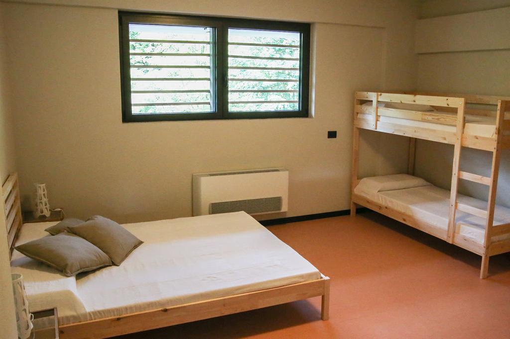 Oasi Hostel Merone Szoba fotó