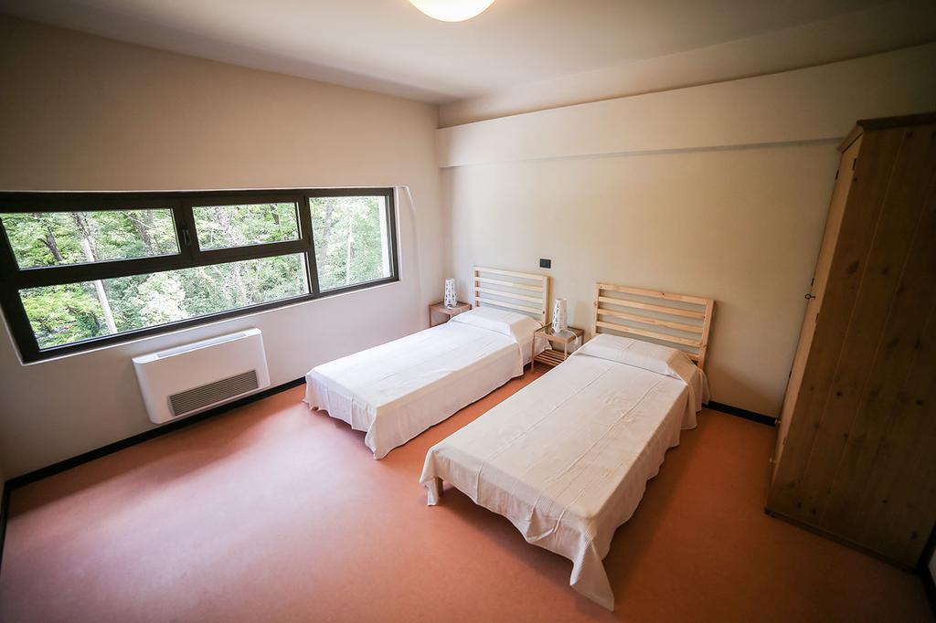 Oasi Hostel Merone Szoba fotó